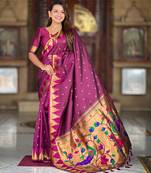 Wine elegant art silk woven saree with rich zari border