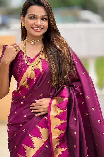 Wine elegant art silk woven saree with rich zari border