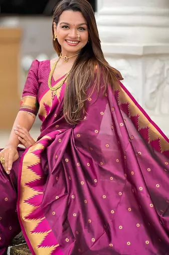 Wine elegant art silk woven saree with rich zari border