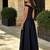 Luxe black embroidered satin gown