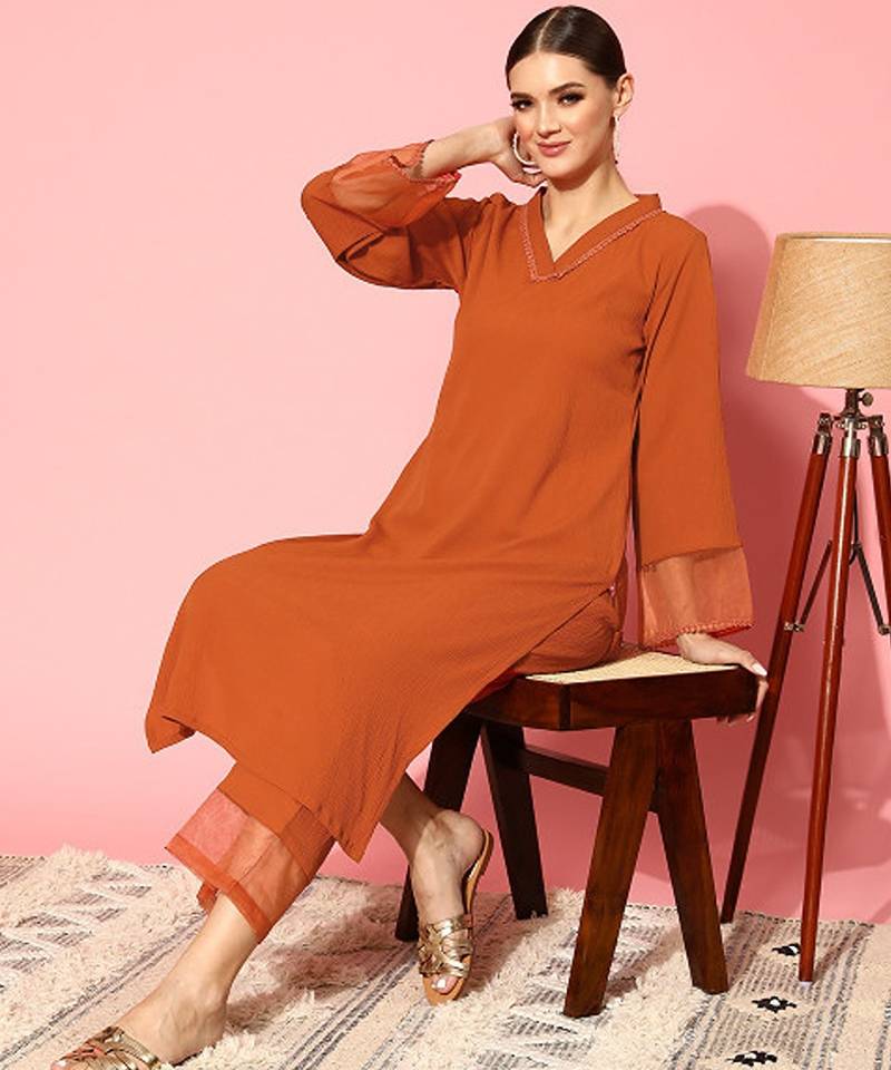 Rust flared sleeve organza detailed v neck textured kurta with palazzo