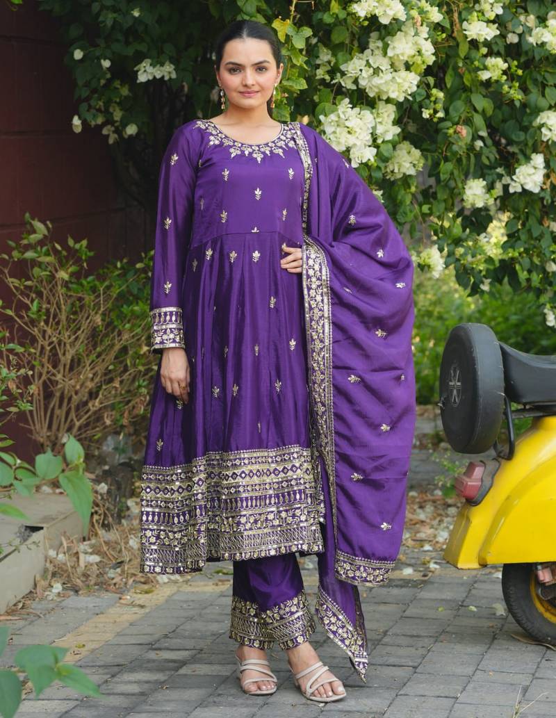 Purple color chinnon silk embroidery work long gown