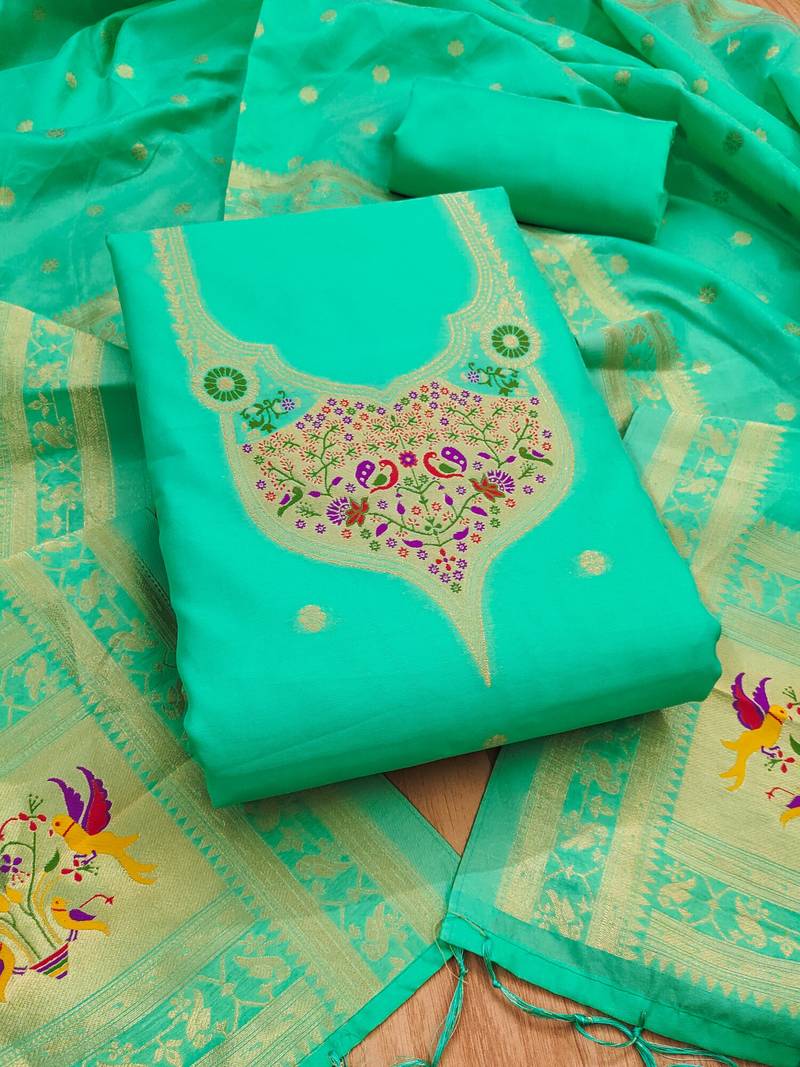 Sea green soft banarasi silk pure zari woven design dress material