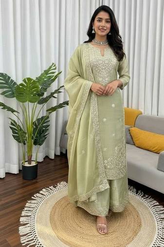 Pista green embroidered silk kurta palazzo set