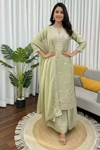 Pista green embroidered silk kurta palazzo set