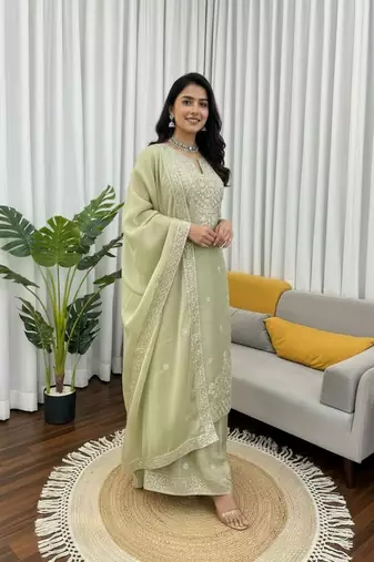 Pista green embroidered silk kurta palazzo set