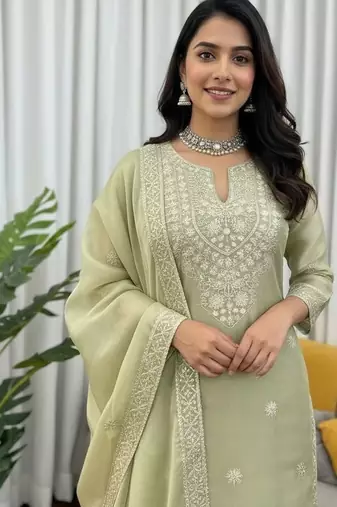 Pista green embroidered silk kurta palazzo set