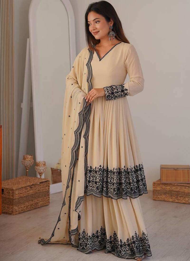 Cream faux georgette heavy embroidery work designer party wear palazzo suit