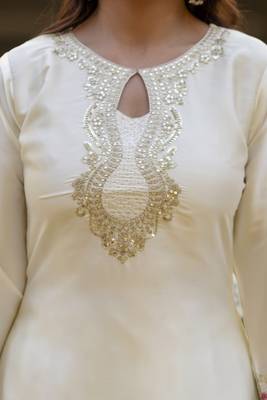 White classic traditional patiala suit set in japan satin with rich embroidery & floral motifs for festive 2