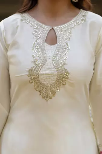 White classic traditional patiala suit set in japan satin with rich embroidery & floral motifs for festive
