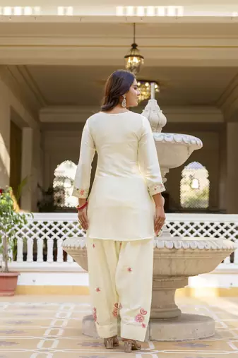White classic traditional patiala suit set in japan satin with rich embroidery & floral motifs for festive