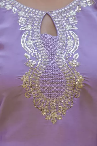 Purple classic traditional patiala suit set in japan satin with rich embroidery & floral motifsfor festive