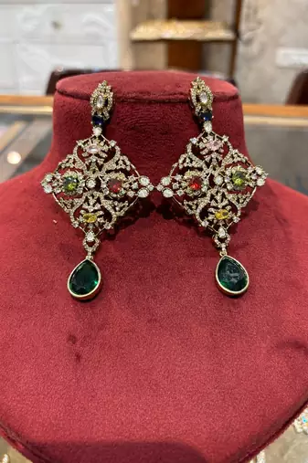 Silver alloy bela diamond earrings