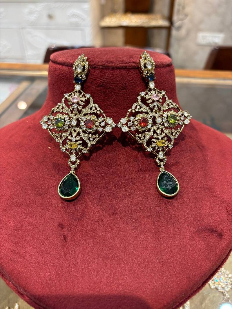 Silver alloy bela diamond earrings