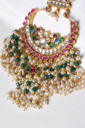 Gold alloy laksheta kundan chandbali