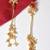 Gold alloy inayata fusion earrings   ruby
