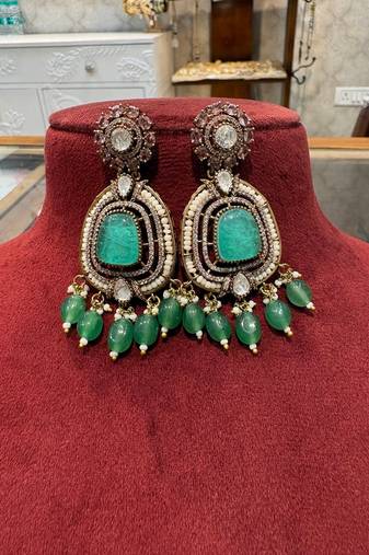Gold alloy ikshitha kundan earrings