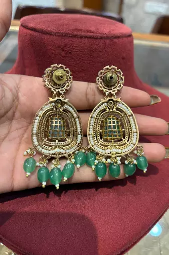 Gold alloy ikshitha kundan earrings
