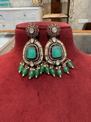 Gold alloy ikshitha kundan earrings 4