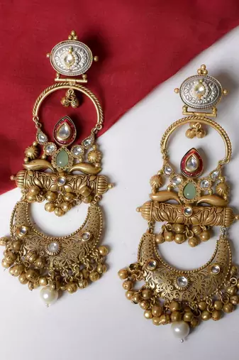 Gold alloy chaitra oversized fusion earrings