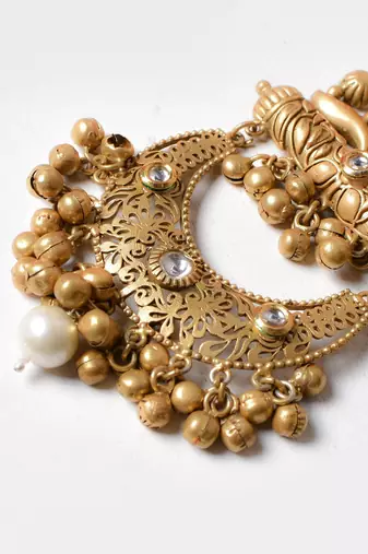 Gold alloy chaitra oversized fusion earrings