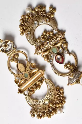 Gold alloy chaitra oversized fusion earrings