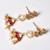 Gold alloy itika kundan earrings