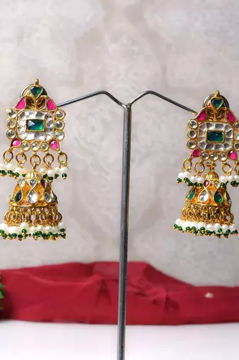 Gold alloy drishani kundan jhumka earrings