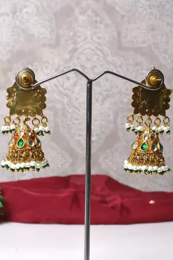 Gold alloy drishani kundan jhumka earrings