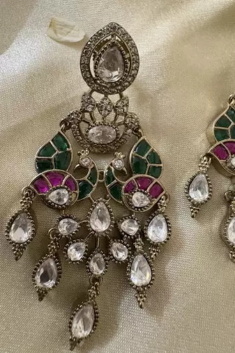 Gold alloy vama polki earrings