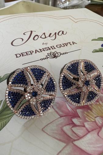 Gold alloy isla stud earrings  blue sapphire