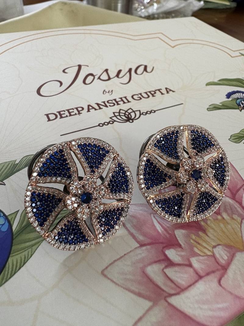 Gold alloy isla stud earrings  blue sapphire