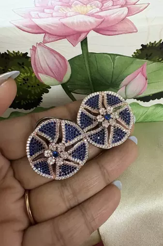 Gold alloy isla stud earrings  blue sapphire