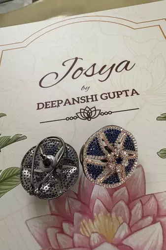 Gold alloy isla stud earrings  blue sapphire