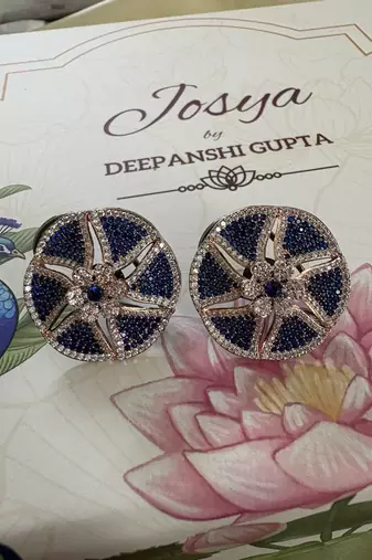 Gold alloy isla stud earrings  blue sapphire