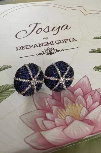 Gold alloy hazel stud earrings  blue sapphire