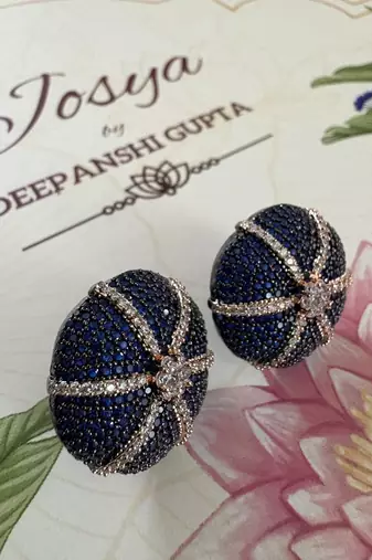 Gold alloy hazel stud earrings  blue sapphire