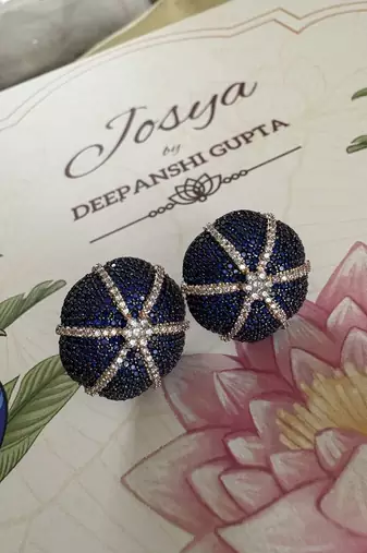 Gold alloy hazel stud earrings  blue sapphire