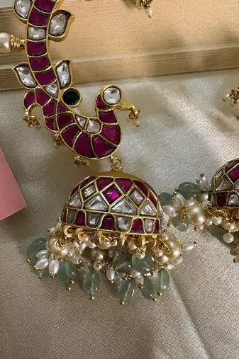 Gold alloy mayur kundan earcuffs