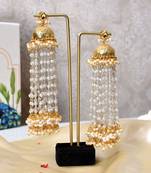 Gold alloy jiva oversized jhumka earrings