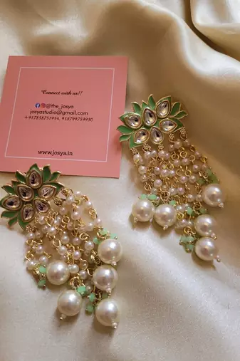 Gold alloy lush green danglers earrings