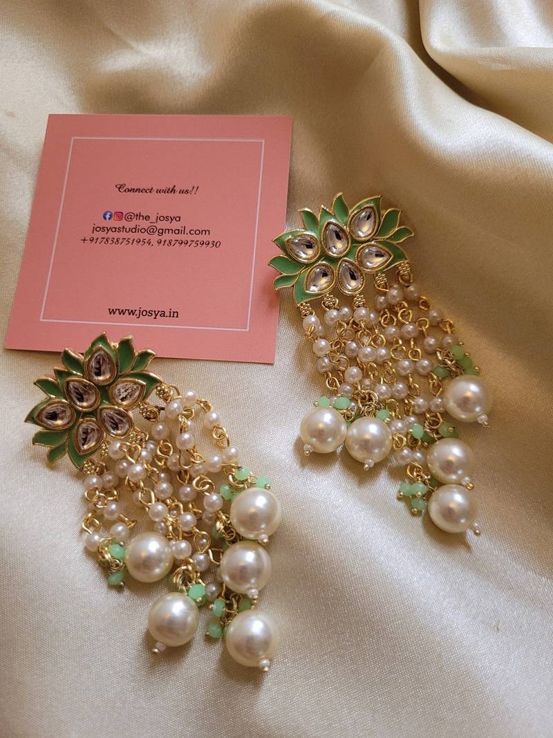 Gold alloy lush green danglers earrings