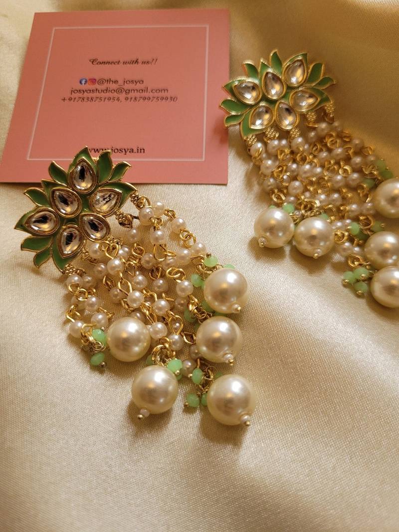 Gold alloy lush green danglers earrings