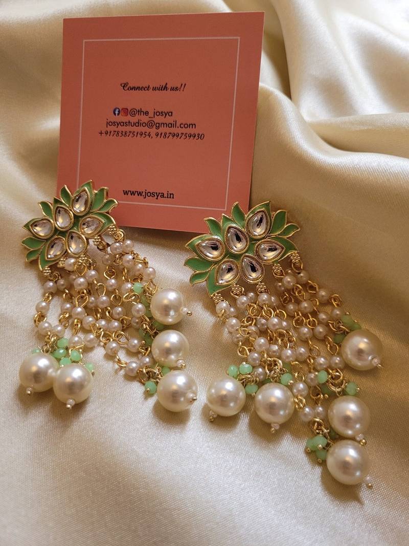 Gold alloy lush green danglers earrings