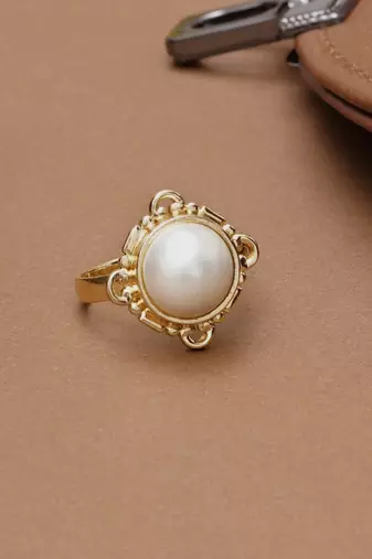 white brass ring with pearl halo floral work