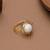 white brass ring with pearl halo floral work