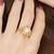 white brass ring with pearl halo floral work
