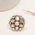 white alloy ring with kundan pearl bloom design