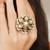 white alloy ring with kundan pearl bloom design