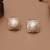 white brass studs with pearl frame design